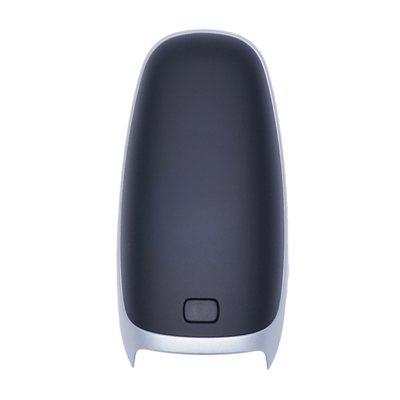 11556A-back - SFFobs Inc. Top-down view of a black, pill-shaped handheld device with a small rectangular button at the bottom and a silver rim.