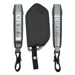 Set of three car key fobs with silver buttons (lock, unlock, hold/trunk) arranged around a black protective sleeve with a leather strap.