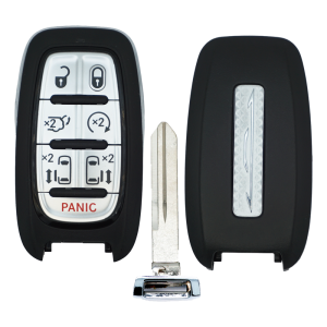 Car key fob with black casing, showing panic button and lock/unlock buttons, separated from its metal key blade.