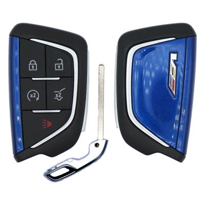 Disassembled car key fob with blue and black shells separated; shows lock, unlock, trunk release, and panic buttons.