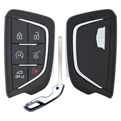 Pair of black car key fobs separated with a metal key blade between them; left fob shows lock/unlock, remote start, and alarm buttons.