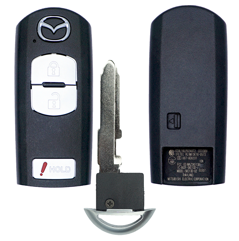 11977 - SFFobs Inc. Mazda car key fob with two white buttons (lock and unlock) and a hold/panic button, plus the detached metal key blade seen beside it