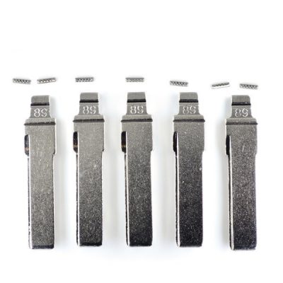 Five metal lighters standing upright in a row, their flint wheels removed and small pieces hovering above them.