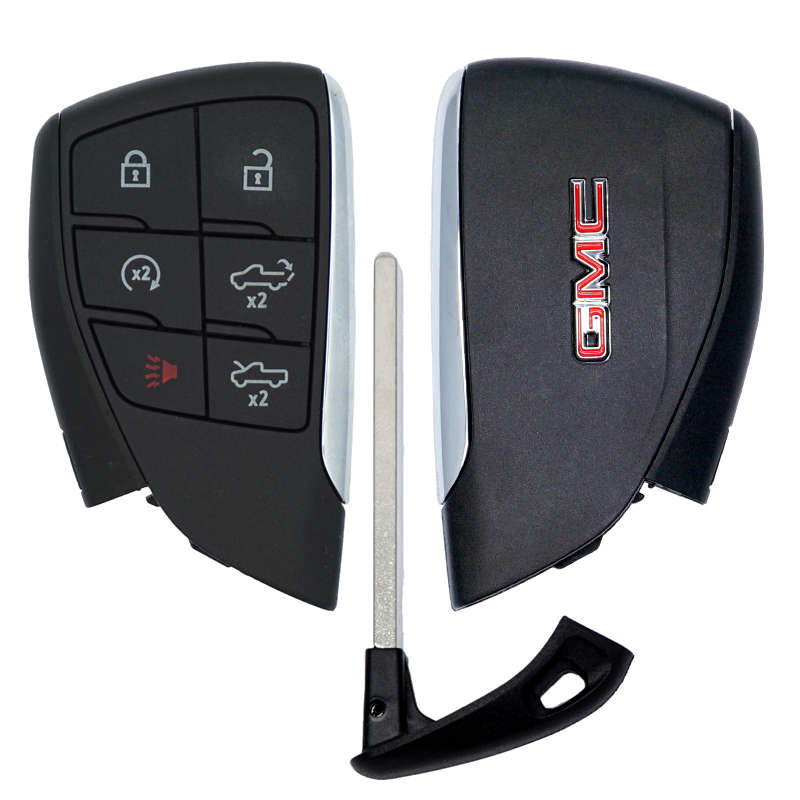 11995U - SFFobs Inc. Pair of GMC car key fobs with a metal key blade and a separate plastic fob; one side shows lock, unlock, and trunk buttons, the other side bears the GMC logo.